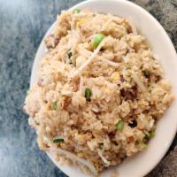 House Fried Rice · Rice stir-fried with beansprouts, broccoli, green onions, eggs and yellow curry with your ch...