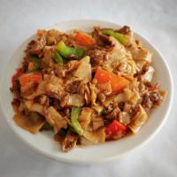 Pad Kee Mao · Wide rice noodles stir-fried with basil, bell peppers, broccoli, eggs and tomatoes with your...
