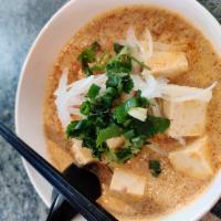 Mee Ka-Tee · Coconut milk with eggs, ground chicken, red curry, yellow bean paste and vermicelli noodles ...