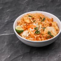 Pad Thai Stir-Fried Noodles · Thai famous stir-fried rice noodle with eggs, bean sprouts, green onions, cilantro and crush...