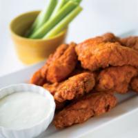 Boneless Buffalo Tenders · Hand-breaded fresh chicken tossed in your choice of sauce. Served with celery sticks and blu...