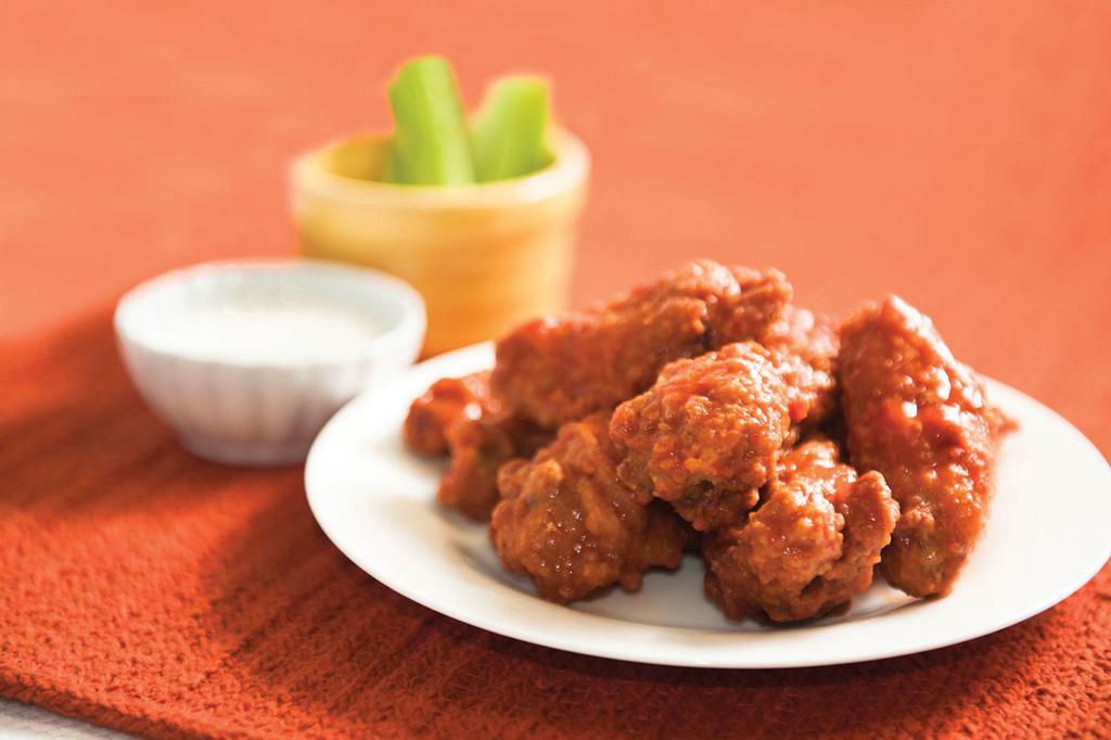 On-the-Bone Wings · Your choice of plain or tossed your choice of sauce. Served with celery sticks and blue cheese.
