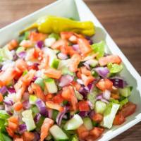 Garden Salad · Fresh lettuce blend, tomatoes, cucumbers, peppers, red onions and pepperoncini.