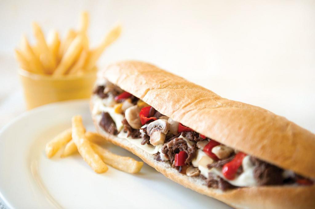 Steak Bomb Sub · Shaved top grade sirloin, mixed peppers, mushrooms, onions and American cheese.