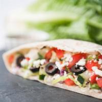 Greek Pocket Sub · Red onions, peppers, tomatoes, crisp lettuce, olives, cucumbers, feta cheese and special dre...