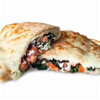Mediterranean Calzone · White pizza(oil and garlic), olives, tomatoes, spinach and feta cheese.