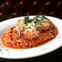 Chicken Parmesan · Breaded grilled chicken breast served over spaghetti with marinara. Topped with melted smoke...