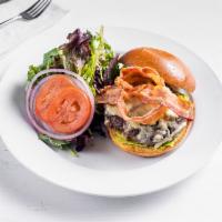 Brioche Bergamote Burger · Bacon, cheese, chipotle dressing and side of greens.