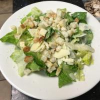 Caesar Salad · Romaine, Parmesan blend and croutons.