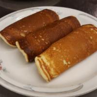 3 Little Pig Roll-Ups · Link sausage rolled in 3 large buttermilk pancakes.