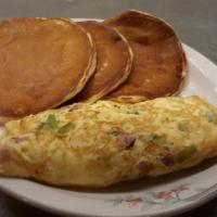 Western Omelet · Ham, onion, green pepper and cheddar cheese.