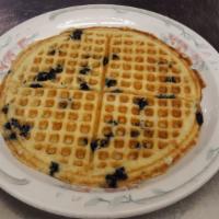 Classic Blueberry Waffle · Served with blueberry compote and whipped cream.