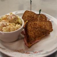 Grilled Ham and Cheese Sandwich · Thin sliced pit ham and melted cheddar cheese.