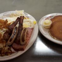 The FPH Combo · 2 strips of bacon, 2 sausage links, half slice of ham, 3 eggs, hashbrowns and 2 buttermilk p...