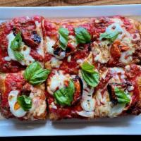 Margherita · Fresh Mozzarella, Oven-Dried Tomato, Fresh Basil, Provolone, Olive Oil
