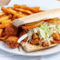 Popcorn Shrimp Po Boy · Toasted Gambino Bread with Lettuce, Tomato, Pickles, & Remoulade - Comes with Catch Fries & ...