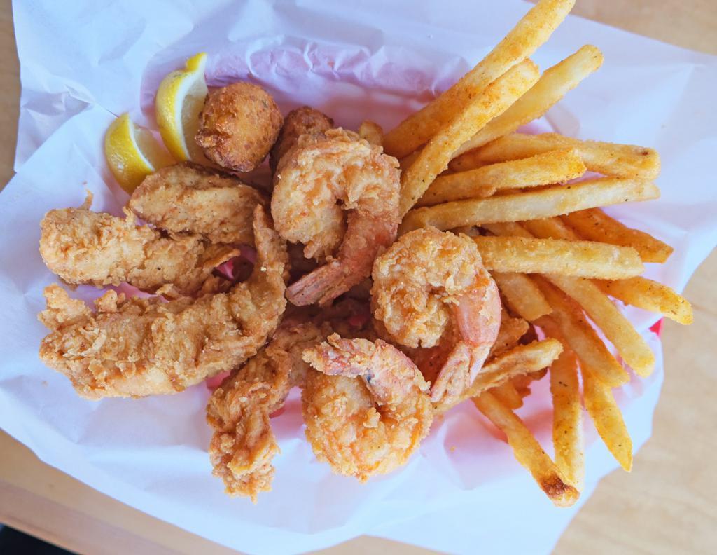 Shrimp & Chicken Tenders Combo · 3 Jumbo Shrimp/ 4 Chicken Tenders - Served with Catch Fries & Hush Puppies