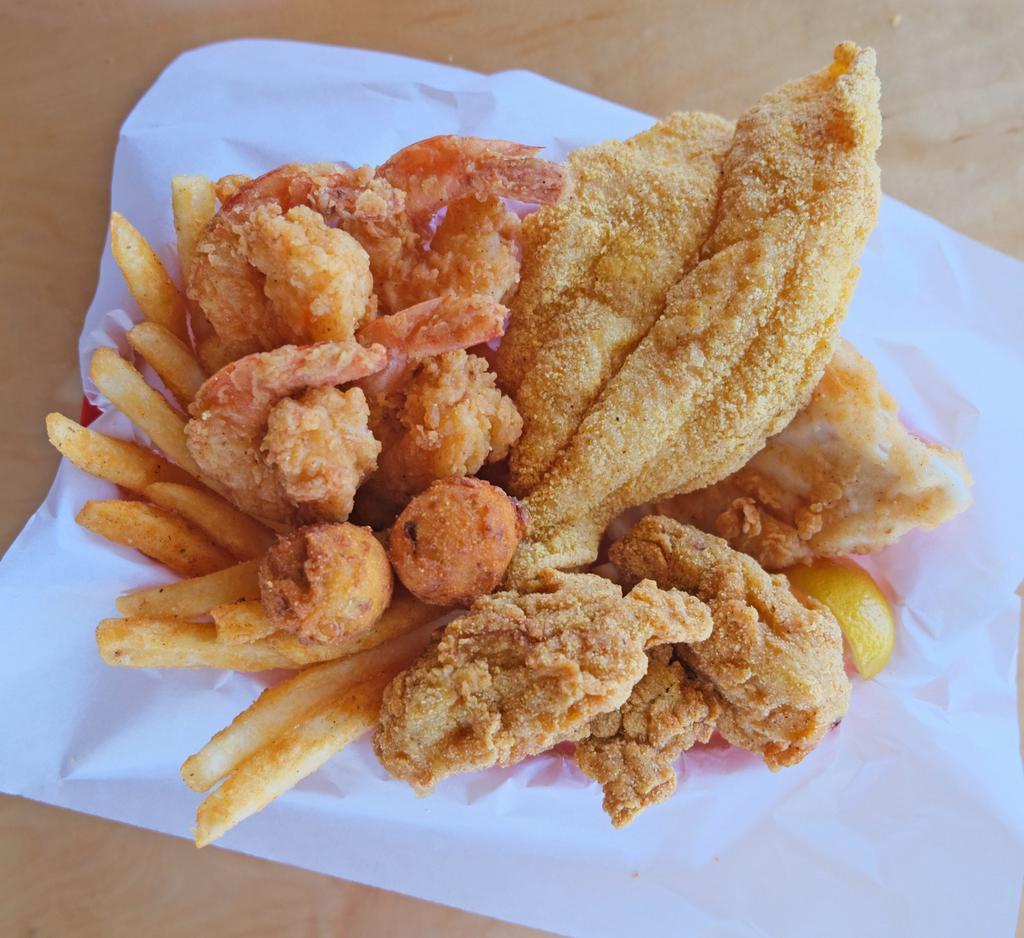 Catch 22 Combo · 1 Catfish Fillet, 1 Whitefish Fillet, 4 Jumbo Shrimp, & 3 Oysters - Served with Catch Fries & Hush Puppies