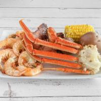 The Catch Boil · 1/2 Pound of Snow Crab, 1/2 Pound of Boiled Shrimp, 1/2 Pound of Sausage with Corn & Potatoes