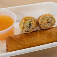 Egg Rolls · Seasoned chicken with glass noodles and carrots all wrapped up in a crispy spring roll and f...