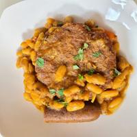 Cassoulet Toulousain · Slow cooked casserole with white beans, vegan sausage (pea protein, peppers, garlic, onions)...