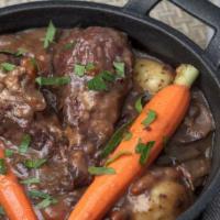 Coq au Vin · Chicken leg (pea protein) braised with red wine (pinot noir) and herbs de provence, hand pee...