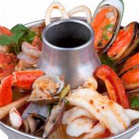 Seafood Soup · Hot and sour, Thai style, and a medley of seafood.