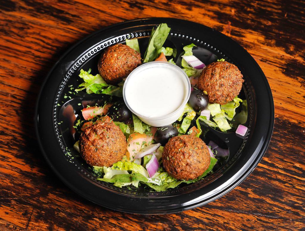 4 Pieces Falafel · Round patties of ground garbanzos mixed with finely chopped onions, garlic, parsley, cilantro and spices. Lightly fried and served with tzatziki sauce and pita bread.