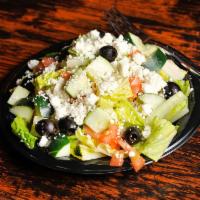 Greek Salad · Lettuce, tomatoes, green pepper, black olives ,feta chess and choice of dressing