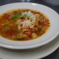 Tortilla Soup · White chicken meat with veggies, rice, sliced avocado, cheese and pico de gallo.