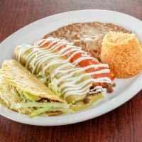 Matamoros Combo · 1 hard taco, 1 red and 1 green enchilada. Served with rice and beans.