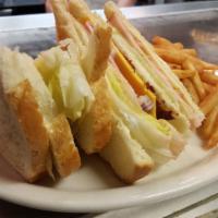 THE DAM CLUB · Three slices of toasted bread with turkey, ham, bacon, cheese, lettuce, tomato, onion and ma...