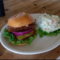 FRIED FISH SANDWICH · A fried fish patty on a toasted bun, tartar sauce, lettuce, tomato and onion.