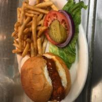BUFFALO CHICKEN SANDWICH · Chicken tossed in wing sauce on a toasted bun with your choice of side. 