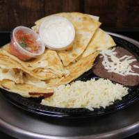 Quesadilla · Includes pico de gallo and sour cream. Served with rice and beans.