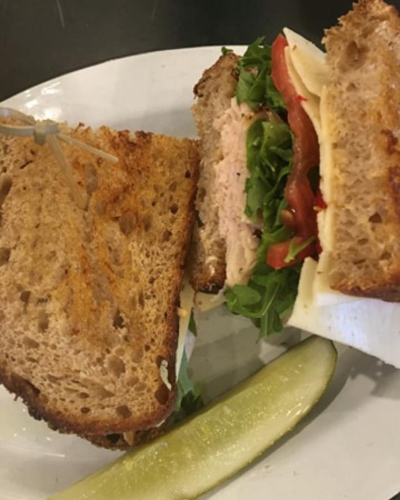 Roasted Turkey Sandwich · Comes with arugula, tomato, and pepper jack cheese on multigrain bread.