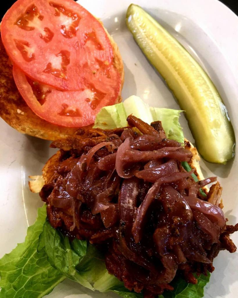 Pulled Pork Sandwich · Comes with caramelized onions on a brioche roll.