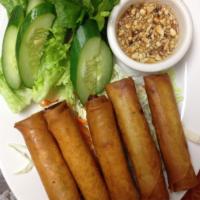 SPRING ROLLS · 5 pieces. Long rice, carrots, onions, taro, wrapped in egg paper, deep-fried golden. Served ...