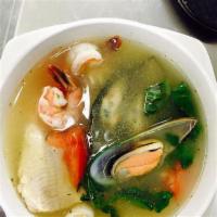 POH TAEK · THAI BASIL SEAFOOD SOUP: Light tangy broth with shrimp, calamari, mussels, fish, mushrooms, ...