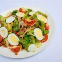 MAMA OLAY’S SALAD · Lettuce, cucumbers, carrots, onions, tomatoes, cilantro tossed in Mama Olay’s vinaigrette dr...