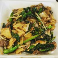 PAD KI MAO · Drunken Noodles. Wok fried chow fun noodles in Mama Olay’s spicy sauce, eggs, Chinese brocco...