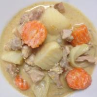 YELLOW CURRY · Gaeng kari. Yellow curry simmered in coconut milk, carrots, potatoes, and onions.
