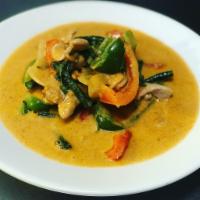 PANANG CURRY · Peanut curry. Panang curry simmered in coconut milk, peanut butter, bell peppers, onions, lo...
