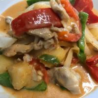 PINEAPPLE CURRY · Gaeng sapparot. Red curry simmered in coconut milk, pineapples, onions, bell peppers, and Th...