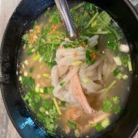 KHAO PIEK SEN · CHICKEN UDON SOUP. Mama Olay’s hearty chicken noodle soup.