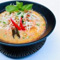 KHAO POON · Coconut Curry Noodle Soup. Creamy coconut red curry broth with vermicelli noodles, minced po...