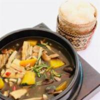 GAENG NOR MAI · Stewed Yanang leaves with bamboo shoots, Kabocha pumpkin, mushrooms, veggies, herbs, and spi...