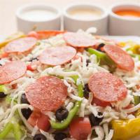 Italian Salad · Black olives, pepperoncini, pepperoni and mozzarella cheese. Served with Romaine and iceberg...