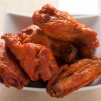 Buffalo Chicken Wings · All wing sauces made in house from original recipes. Hot and spicy, mild, BBQ, garlic parmes...