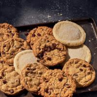 Dozen Cookies · An assortment of 12 freshly baked cookies, including: Chocolate Chip, Oatmeal Raisin, and Su...